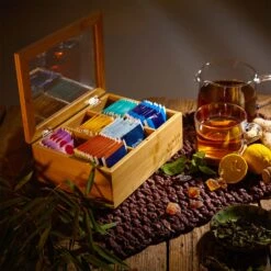 Teebox 6 Fächer 90 Teebeutel Kunststoff-Sichtfenster Bambus -Warmekuche Pro Geschaft 10038069 yy 0003 logo